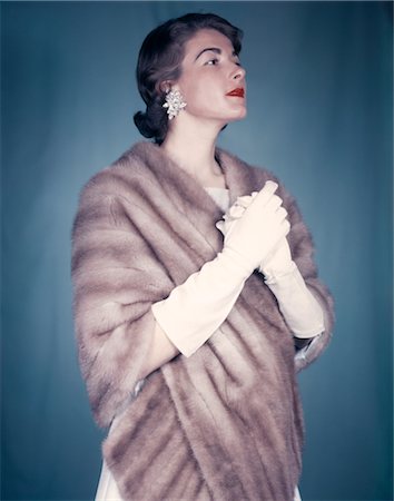 1950s HIGH FASHION ELEGANT WOMAN IN FUR STOLE KID GLOVES AND DIAMOND EARRINGS Stock Photo - Rights-Managed, Code: 846-02794208