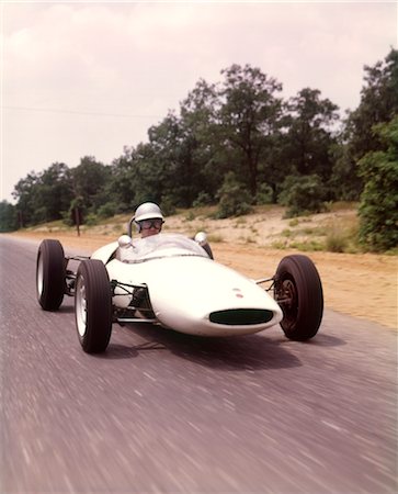 ford - 1960s LOTUS FORD SPORTS RACE CAR AND DRIVER WEARING HELMET AND GOGGLES RACING Stock Photo - Rights-Managed, Code: 846-02794611