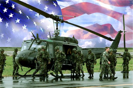 COMPOSITE IMAGE GROUP OF US ARMY RESERVES BY HELICOPTER WITH US FLAG BACKGROUND PATRIOTISM Stock Photo - Rights-Managed, Code: 846-02794646