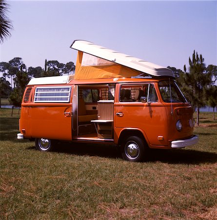 1970s ORANGE & WHITE VOLKSWAGEN BUS WESTFALIA MOTOR HOME WITH ROOF AND SLIDING SIDE DOOR OPEN Stock Photo - Rights-Managed, Code: 846-02794807