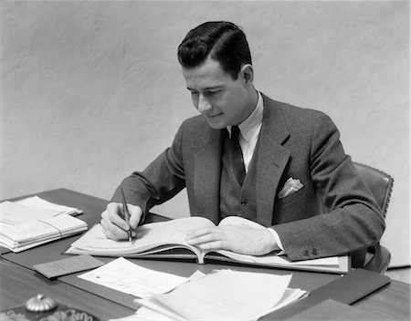 simsearch:846-02796457,k - 1930s MAN AT DESK IN OFFICE WRITING Stock Photo - Rights-Managed, Code: 846-02795800
