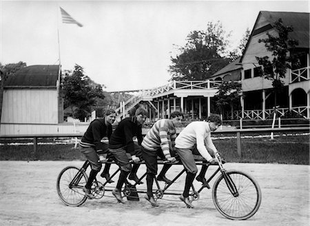 simsearch:400-08938779,k - 1890s 1900s FOUR YOUNG COLLEGE MEN RIDING PEDDLING FOUR SEAT RACING BICYCLE Stock Photo - Rights-Managed, Code: 846-02795880