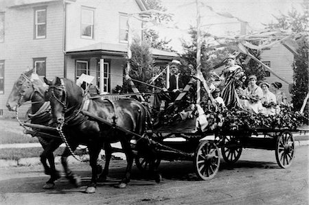 simsearch:846-02796457,k - 1890s 1900s TURN OF THE CENTURY HORSE & WAGON IN PARADE DECORATED WITH FLOWERS & STREAMERS Stock Photo - Rights-Managed, Code: 846-02795951