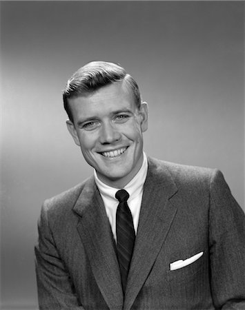 1950s PORTRAIT MAN BUSINESSMAN SUIT TIE SMILING TEETH LOOKING AT CAMERA Stock Photo - Rights-Managed, Code: 846-02796164