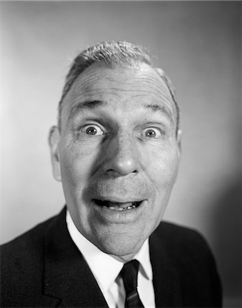 1950s 1960s MIDDLE AGED MAN HEAD SHOT WITH AMAZED SURPRISED WACKY EXPRESSION FACE ELONGATED BY LENS DISTORTION Stock Photo - Rights-Managed, Code: 846-02796220