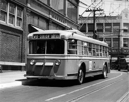 1930s 1940s ALL SERVICE VEHICLE OPERATES AS TROLLEY BUS OR GASOLINE BUS PUBLIC TRANSPORTATION RETRO ELIZABETH NJ Stock Photo - Rights-Managed, Code: 846-02796494