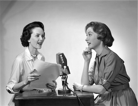 simsearch:846-02796457,k - 1950s TWO WOMEN DOING RADIO BROADCAST INDOOR Stock Photo - Rights-Managed, Code: 846-02796674