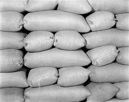 sack - 1920s 1930s 1940s PILE OF SACKS IN OVERALL PATTERN Stock Photo - Rights-Managed, Code: 846-02796785