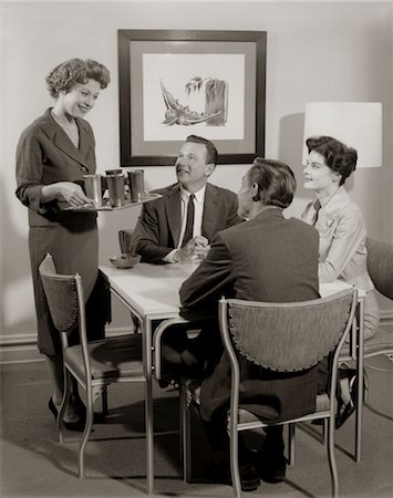 1950s CARD PARTY OF 2 COUPLES WITH WOMAN SERVING DRINKS Stock Photo - Rights-Managed, Code: 846-02796799