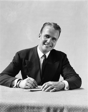 simsearch:846-02796457,k - 1940s MAN IN SUIT SITTING AT TABLE WRITING Stock Photo - Rights-Managed, Code: 846-02797175