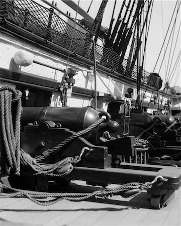 ROW OF CANNON BREECHES ON GUN DECK OF SAILING  NAVAL SHIP OF WAR Stock Photo - Rights-Managed, Code: 846-02797265