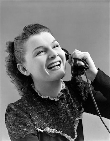 1940s WOMAN TALKING LAUGHING ON TELEPHONE Foto de stock - Con derechos protegidos, Código: 846-02797710
