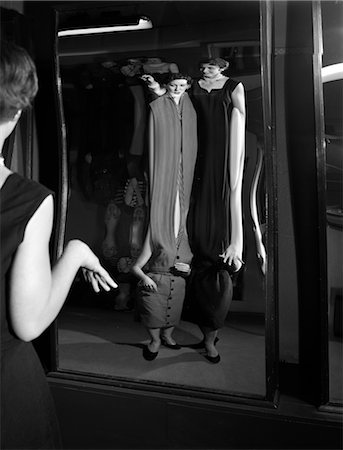 1950s TWO YOUNG WOMEN LOOKING AT DISTORTED REFLECTION IN FUN HOUSE MIRROR Stock Photo - Rights-Managed, Code: 846-02791880