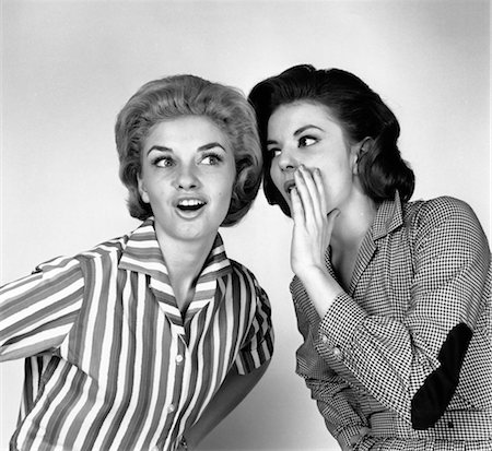 people gossiping - 1960s WOMAN WHISPERING SECRET INTO HER GIRLFRIEND'S EAR Stock Photo - Rights-Managed, Code: 846-02792150