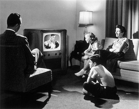 1950s FAMILY IN LIVING ROOM WATCHING TELEVISION Stock Photo - Rights-Managed, Code: 846-02792168