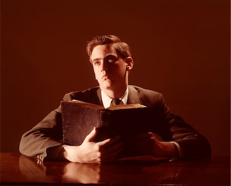 simsearch:846-03165636,k - 1960s YOUNG MAN LOOKING UPWARD HOLDING HOLY BIBLE Stock Photo - Rights-Managed, Code: 846-02792544