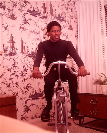 pedal - 1960s AFRICAN AMERICAN MAN ON EXERCISE CYCLE Stock Photo - Rights-Managed, Code: 846-02792623