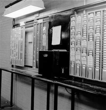 1960s TIME CLOCK & CARD SLOTS IN LARGE FACTORY Stock Photo - Rights-Managed, Code: 846-02793412