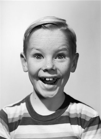 1950s PORTRAIT HAPPY SMILING BOY STRIPE SHIRT SILLY ELATED FACIAL EXPRESSION Stock Photo - Rights-Managed, Code: 846-02793651