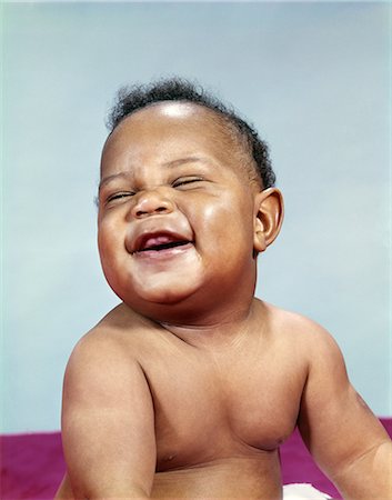 1960s AFRICAN-AMERICAN BABY BOY PORTRAIT LAUGHING SMILING HAPPY FACE Foto de stock - Con derechos protegidos, Código: 846-03165106