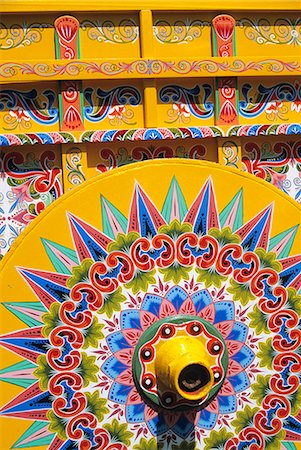 COLORFULLY PAINTED OXCART WHEEL AT STORE SARCHI COSTA RICA Stock Photo - Rights-Managed, Code: 846-03165261