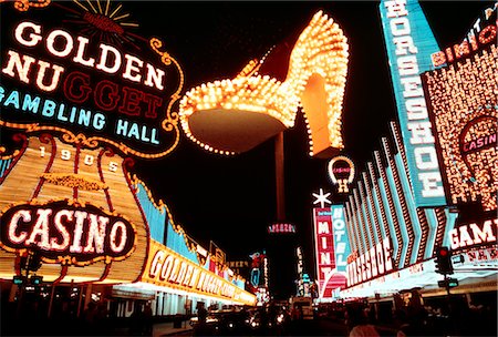 1970s MONTAGE OF NEON CASINO LIGHTS ON FREMONT STREET DOWNTOWN LAS VEGAS NEVADA AND THE FAMOUS GOLDEN SLIPPER SHOE Stock Photo - Rights-Managed, Code: 846-03165588