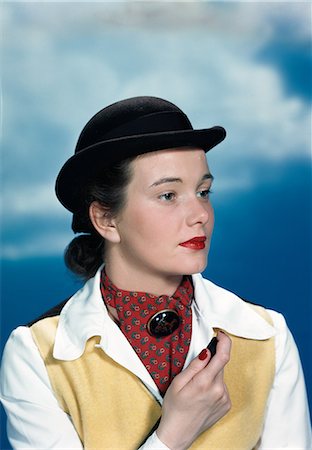 equestrian - 1940s 1950s PORTRAIT TEEN GIRL WEARING EQUESTRIAN OUTFIT DERBY HAT HOLDING RIDING CROP Stock Photo - Rights-Managed, Code: 846-03166375