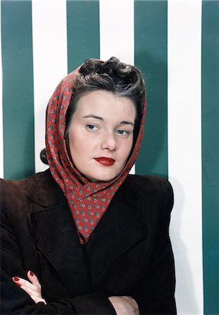 simsearch:846-07200135,k - 1940s 1950s PORTRAIT WOMAN WEARING BROWN SUEDE COAT RED PATTERNED SCARF WRAPPED AROUND HEAD SERIOUS EXPRESSION GREEN WHITE STRIPED WALLPAPER IN BACKGROUND Stock Photo - Rights-Managed, Code: 846-03166372