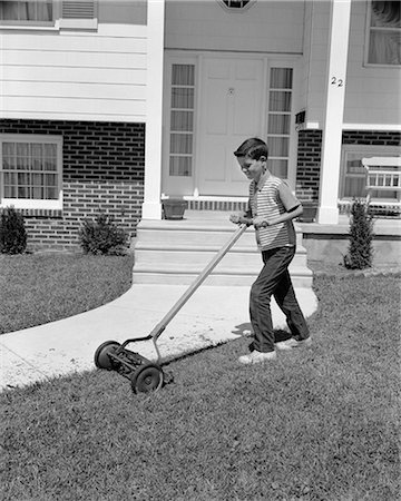retro suburban house - 1960s BOY CUTTING MOWING SUBURBAN HOME FRONT YARD LAWN GRASS USING PUSH LAWNMOWER Stock Photo - Rights-Managed, Code: 846-03163215