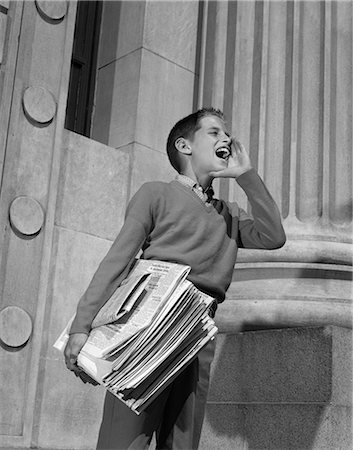 simsearch:846-05646032,k - 1950s 1960s PAPERBOY SHOUTING EXTRA EXTRA SELLING NEWSPAPERS Stock Photo - Rights-Managed, Code: 846-03163217