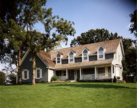 simsearch:846-03163999,k - GRAY TWO STORY HOUSE WITH FRONT PORCH FOUR DORMER STYLE WINDOWS Foto de stock - Con derechos protegidos, Código: 846-03163739