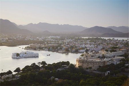 View of City Palace and Lake Palace Hotel, Udaipur, Rajasthan, India, Asia Stock Photo - Rights-Managed, Code: 841-05785332