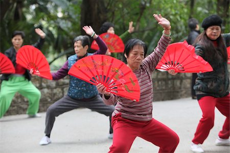 Tai-chi exercises with fans, Macau, China, Asia Stock Photo - Rights-Managed, Code: 841-05785965