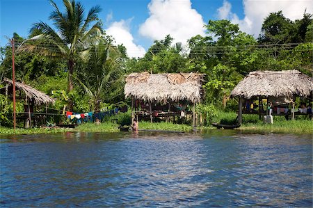 Warao Indian hatched-roof huts built upon stilts, Delta Amacuro, Orinoco Delta, Venezuela, South America Stock Photo - Rights-Managed, Code: 841-05781248