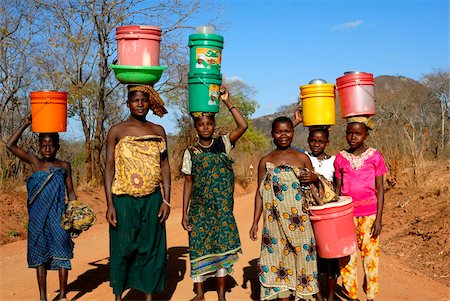 pictures of african traditional dresses - Group of women carrying water on head, Tanzania, East Africa, Africa Stock Photo - Rights-Managed, Code: 841-05781800