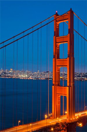 The Golden Gate Bridge, linking the city of San Francisco with Marin County, taken from the Marin Headlands at night with the city in the background and traffic light trails across the bridge, San Francisco, Marin County, California, United States of America, North America Stock Photo - Rights-Managed, Code: 841-05782407