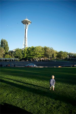 Toddler walks on lawn towards Space Needle at Seattle Center, Seattle, Washington State, United States of America, North America Stock Photo - Rights-Managed, Code: 841-05783367
