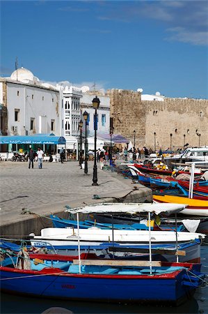 simsearch:841-03673601,k - Fishing boats, old port canal with kasbah wall in background, Bizerte, Tunisia, North Africa, Africa Stock Photo - Rights-Managed, Code: 841-05794581