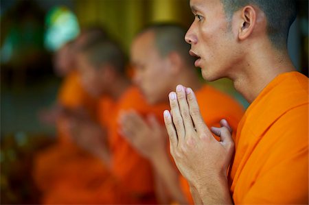 Monk praying in the monastery, Luang Prabang, Laos, Indochina, Southeast Asia, Asia Stock Photo - Rights-Managed, Code: 841-05796587