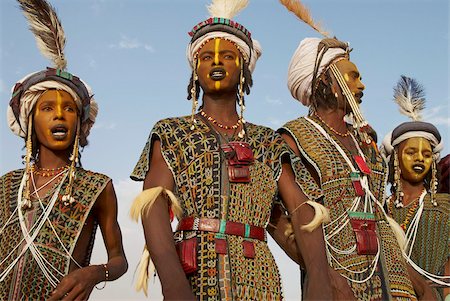 peul - Wodaabe (Bororo) men with faces painted at the annual Gerewol male beauty contest, a general reunion of West African Wodaabe Peuls (Bororo Peul), Niger, West Africa, Africa Stock Photo - Rights-Managed, Code: 841-05796691
