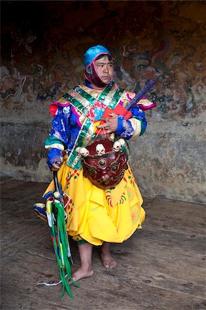 simsearch:841-05845843,k - Buddhist monk in colourful costume waiting to take part in traditional dance at the Tamshing Phala Choepa Tsechu, near Jakar, Bumthang, Bhutan, Asia Stock Photo - Rights-Managed, Code: 841-05845849