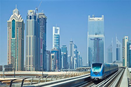 Sheikh Zayed Road skyline of high rise buildings and skyscrapers, and metro train, Dubai City, United Arab Emirates, Middle East Stock Photo - Rights-Managed, Code: 841-05846162