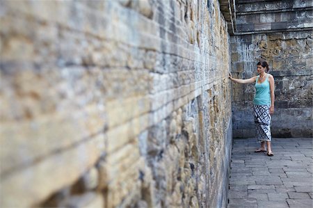 Woman looking at carvings, Borobudur, UNESCO World Heritage Site, Java, Indonesia, Southeast Asia, Asia Stock Photo - Rights-Managed, Code: 841-05846537