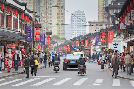 shanghai china - Pedestrians and traffic on Shanghai Old Street, remnant of a bygone age, Fuxing, Shanghai, China, Asia Stock Photo - Rights-Managed, Code: 841-05846837