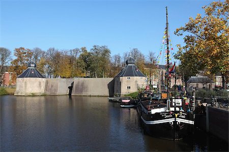 simsearch:700-00031108,k - The Spinola boat is docked in front of the Spanish Gate (Spanjaardsgat) by the harbour of Breda, Noord-Brabant, Netherlands, Europe Stock Photo - Rights-Managed, Code: 841-05847251