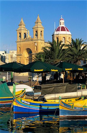 simsearch:841-03672349,k - Harbour with Luzzu fishing boats and Marsaxlokk Parish Church, Marsaxlokk, Malta, Mediterranean, Europe Stock Photo - Rights-Managed, Code: 841-05848565