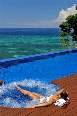 people in hot tub - Girl in the jacuzi, Esacaia Resort and Spa, Bohol, Philippines, Southeast Asia, Asia Stock Photo - Rights-Managed, Code: 841-05959651