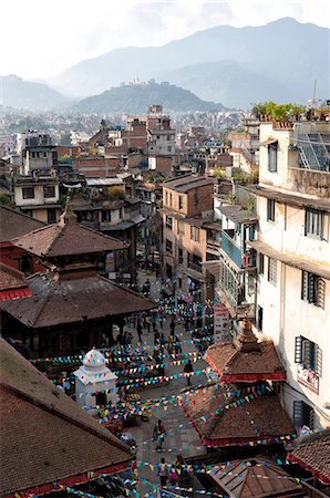 View over narrow streets and rooftops near Durbar Square towards the hilltop temple of Swayambhunath, Kathmandu, Nepal, Asia Stock Photo - Rights-Managed, Code: 841-05959842