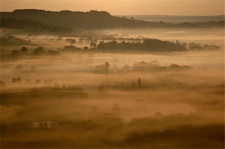 Sunrise over misty valley from the terrace, Vezelay, Burgundy, France, Europe Stock Photo - Rights-Managed, Code: 841-05960492
