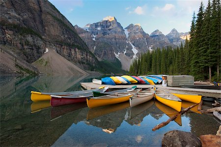Canoes moored on Moraine Lake, Banff National Park, UNESCO World Heritage Site, Alberta, Rocky Mountains, Canada, North America Stock Photo - Rights-Managed, Code: 841-05961793